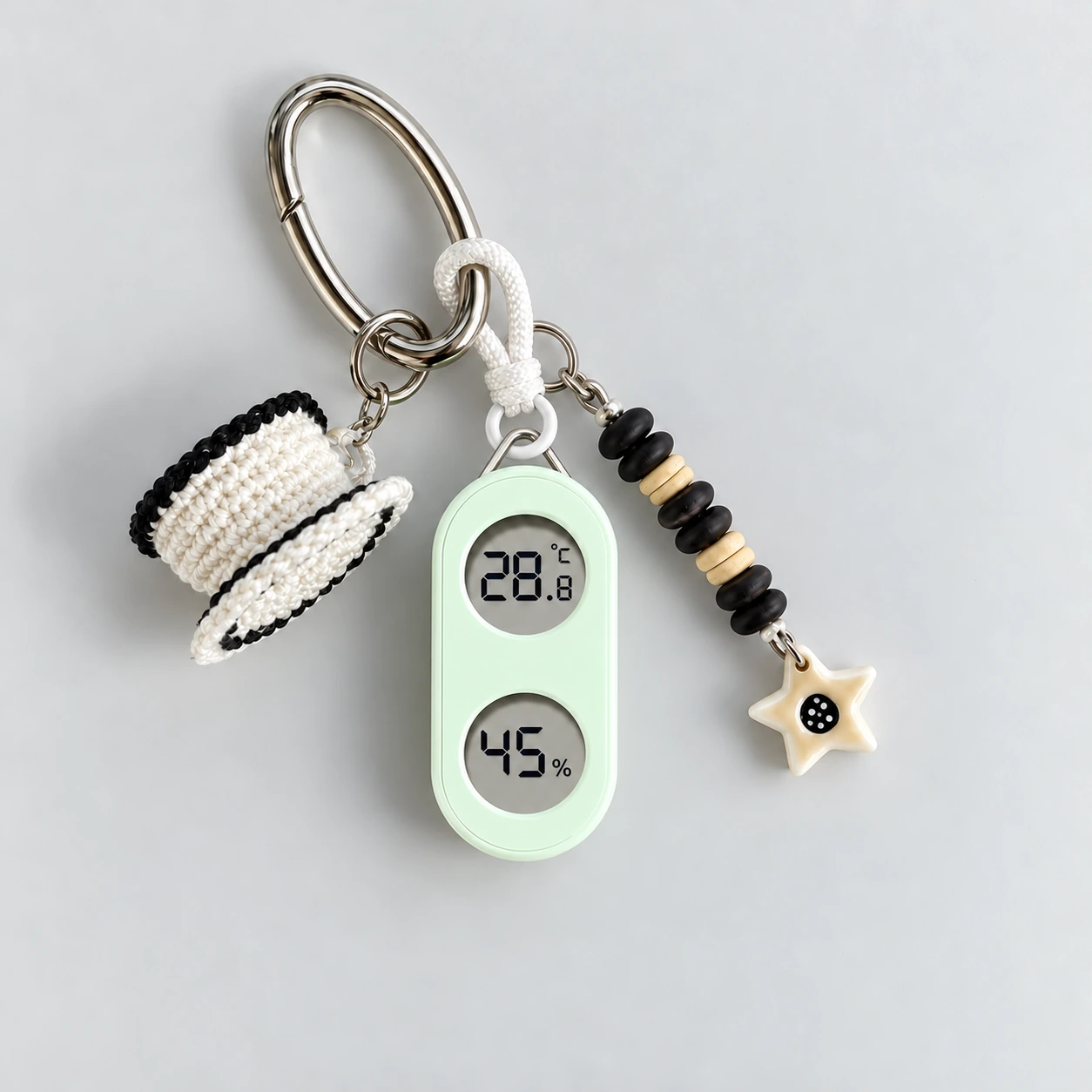 Light Green TH05G thermometer and hygrometer used as a keychain