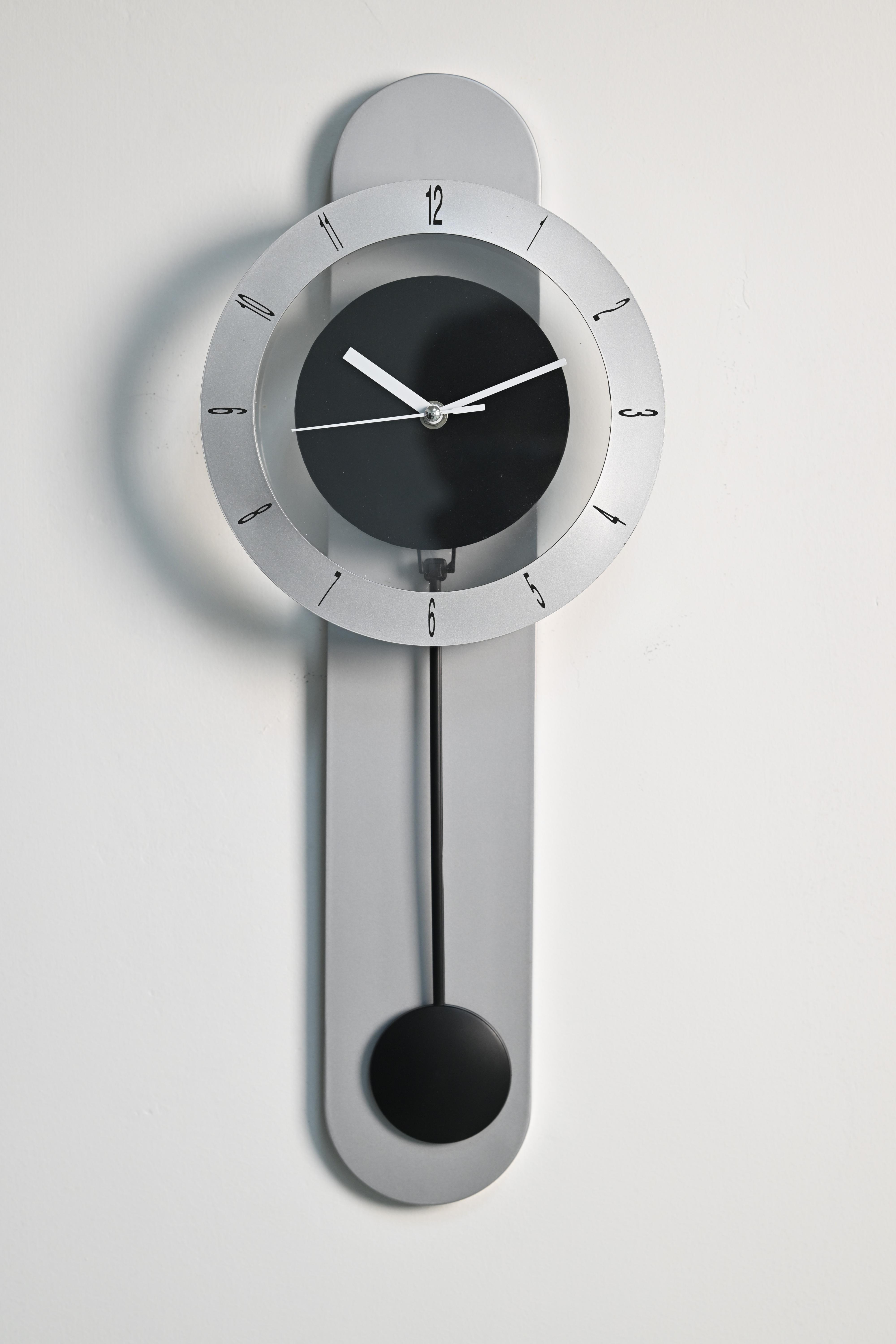 Plastic Pendulum Wall Clock - TP7009 Silver